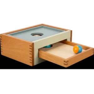 A Montessori-style object permanence box with a sliding tray, ideal for developing cognitive understanding.