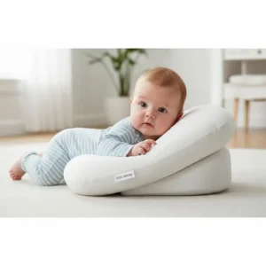 Ergonomic tummy time support pillow designed to assist infants in developing neck and upper body strength.