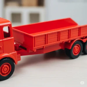 Close-up of a vibrant red trailer toy truck with a detachable flatbed, perfect for imaginative play.