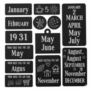 A set of decorative chalkboard-style calendar magnets featuring a vintage font and classic black and white design, ideal for a rustic or farmhouse kitchen aesthetic.
