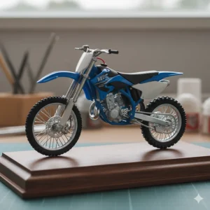 Detailed view of a collector's plastic diecast dirt bike model with intricate suspension.