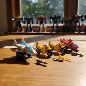 A collector's display of the Transformers Cybertron Mini-Con Team figures, showing their unique designs and small scale accessories for the larger toys.