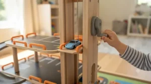 A functioning elevator lift mechanism on a multi-level car garage toy.